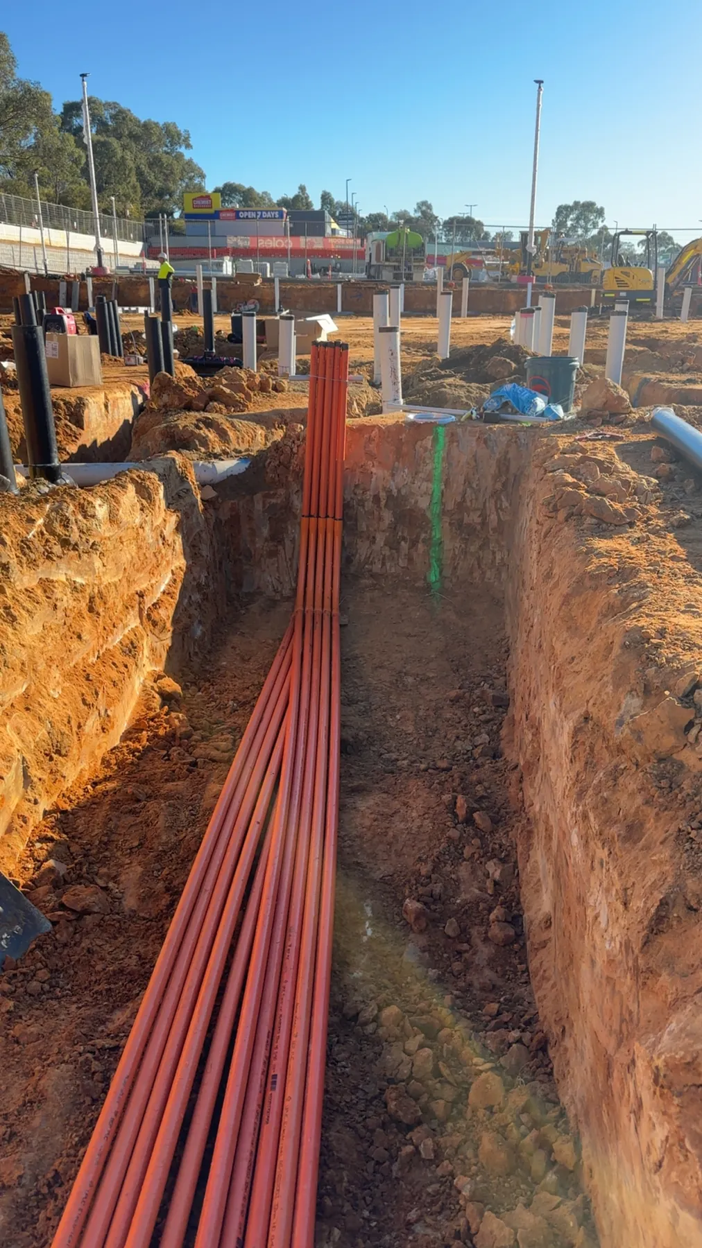 Conduit bank laid in an open trench