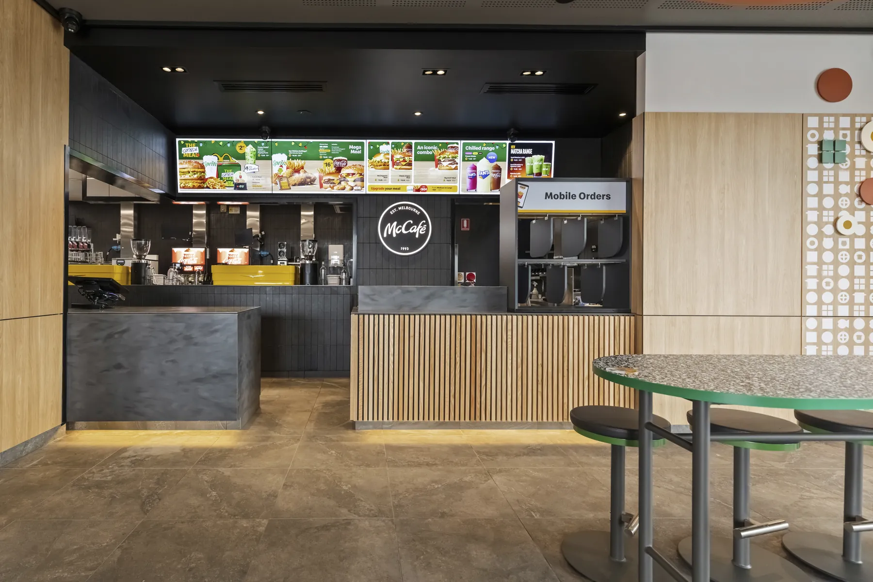 McDonald's counter fit-out with lit menu boards